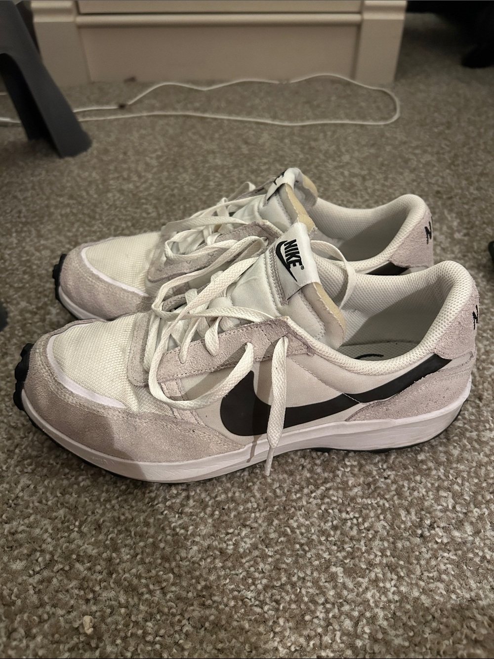 Nike men’s  Pale Pink and White Sneakers with Black Swoosh